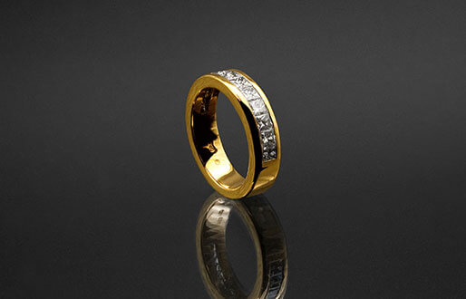Ring mit Diamant-Princess in 750/- Gelbgold