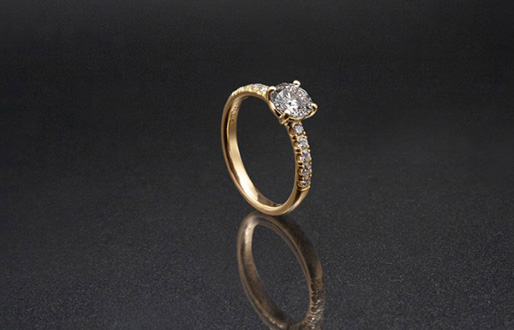 Ring mit 1,02ct Diamant Brillant und 0,3ct Diamant-Brillantbesatz in 750/- Gelbgold