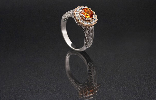 Ring mit Mandarin-Granat und Diamant in 750/- Rosé-/Weißgold